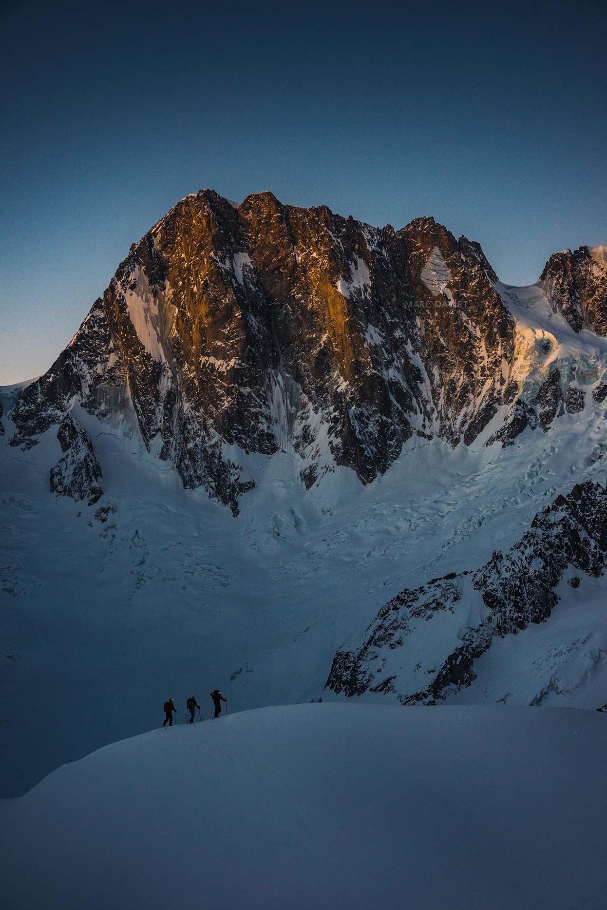 Grandes Jorasses with skiers